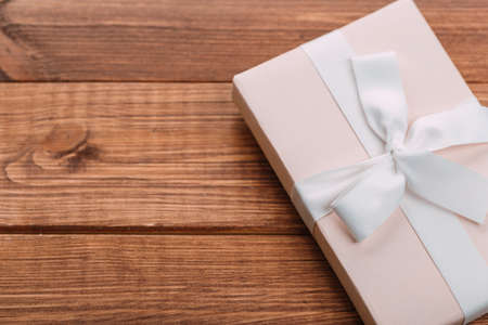 beautiful gift box with altas bow. holiday card concept.