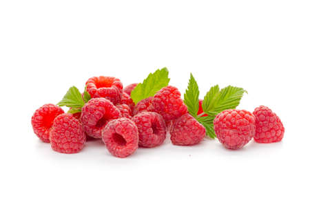 Ripe raspberries with leaf isolated on a white background