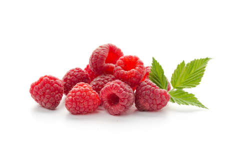 Ripe raspberries with leaf isolated on a white backgroundの写真素材