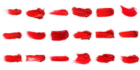 Red colored brush stroke paiting over isolated background, canvas watercolor texture, red lipstick smudgeの写真素材