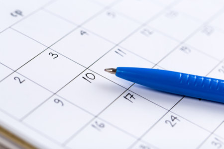 white calendar page for month schedule to make an appointment or manage the schedule every day with ballpoint pen for marks, for work planning and life conceptの写真素材