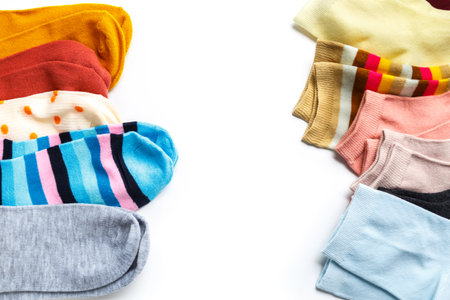 Lots of Pairs of new knitted sports socks isolated on white background.の写真素材