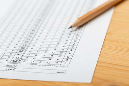 testing in exercise and exam paper. computer sheet with pencil in school test room, education conceptの写真素材