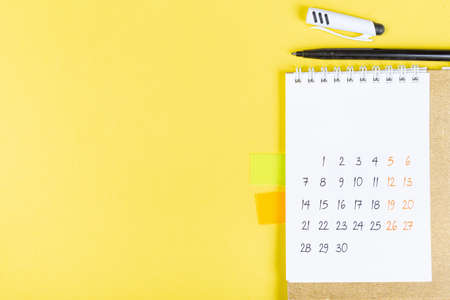 White blank 2021 calendar on solid yellow background with copy space, business meeting schedule, travel planning or project stage and reminder concept.の写真素材