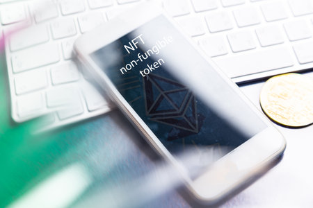 NFT non - fungible tokens inscription in the art frame. A non-fungible token (NFT) is a special type...