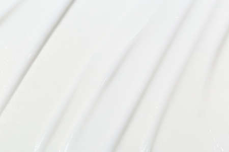 White Cosmetic Cream Isolated on White Background. Lipstick Smear.の写真素材