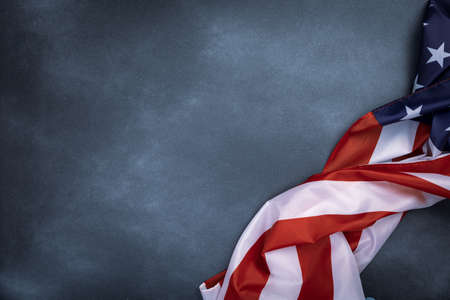 Vintage american flag on grunge background with space for text