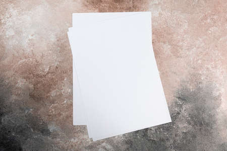 Blank flyer poster a4 or a5 paper isolated on grunge, place for your mock-up designの写真素材