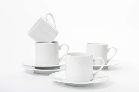 White porcelain cup and saucer for cappuccino and coffee isolated on a white backgroundの写真素材