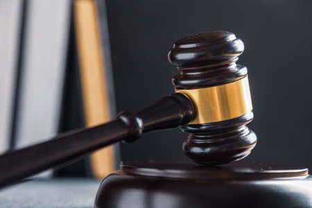 Law and justice. Wooden judge gavel, close-up view.の写真素材