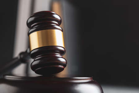 Law and justice. Wooden judge gavel, close-up view.の写真素材