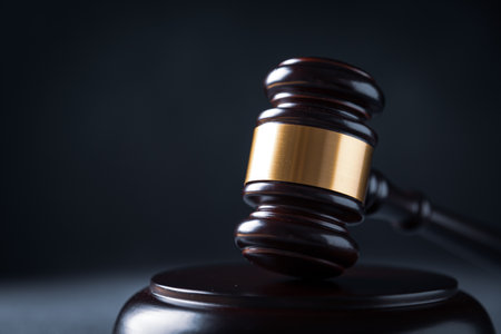 Judge gavel on a homogeneous background Justice and injustice, law