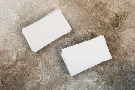 stack of business cards blank mockup on grunge background mocap for design