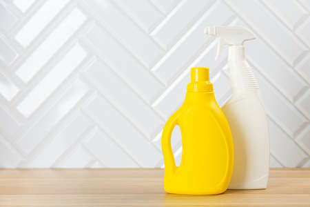 cleaning product on a colored background side view. Professional cleaning products, spring cleaning. Household chemicalsの写真素材