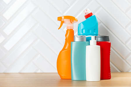 Cleaning bottles for different surfaces in kitchen, bathroom and other rooms. close up. top view....