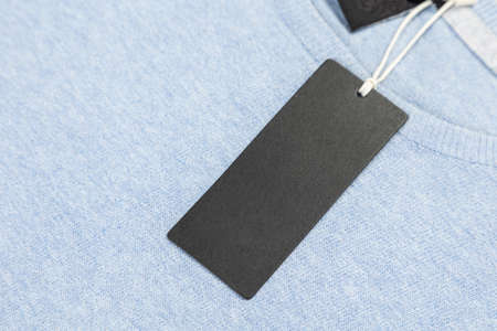 Plain clothing price tag close up place for your text or logo