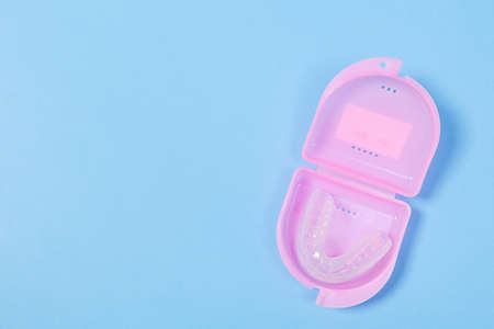 orthodontic silicone simulator. tray for teeth in a case Invisible leveling brackets. Mobile orthodontic appliance for teeth correction. The concept of orthodonticsの写真素材