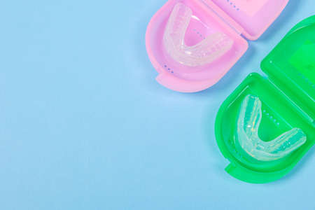 orthodontic silicone simulator. tray for teeth in a case Invisible leveling brackets. Mobile orthodontic appliance for teeth correction. The concept of orthodonticsの写真素材