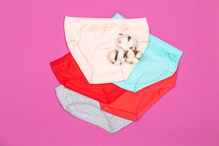 Clothes for children in the form of panties. Clothes for children from soft fabric. panties for girls. A set of panties for children. view from above. Set of underwear. lingerie set.の写真素材