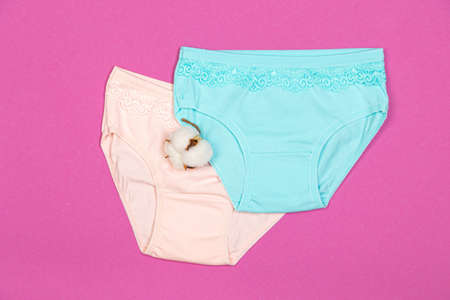 Clothes for children in the form of panties. Clothes for children from soft fabric. panties for girls. A set of panties for children. view from above. Set of underwear. lingerie set.の写真素材