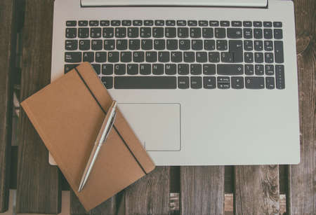 Teleworking concept. Technology. Keyboard with telework button. Concept for any illustration of teleworking or teleworking and home workersの写真素材