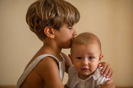 Portrait Of Beautiful Siblings Playing At Home Portrait of beautiful siblings playing at home....