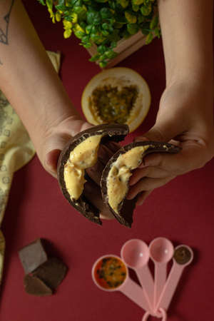 Delicious truffled Easter egg with passion fruit filling. Top Viewの写真素材