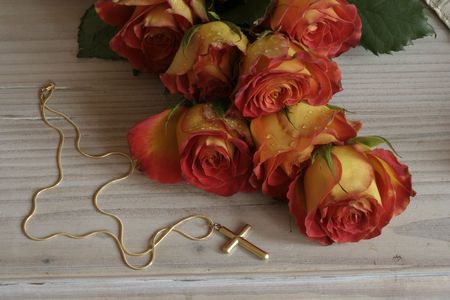 Orange Roses and Crossの写真素材