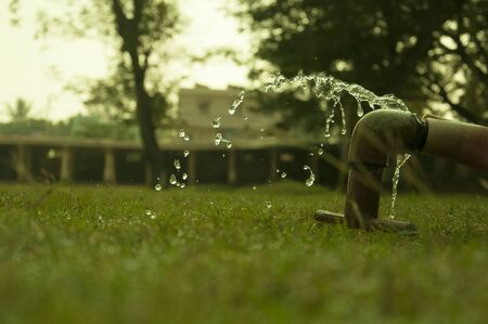 Water Flow with temple backgroundの写真素材