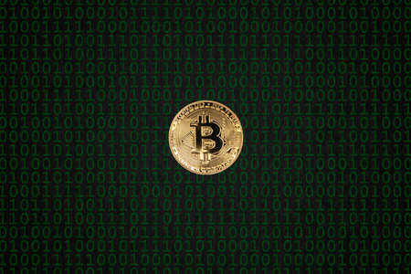 Isolated gold cryptocurrency in the center on a dark abstract background on which there is a mosaic of green zero and one numbers with a rough texture.の写真素材