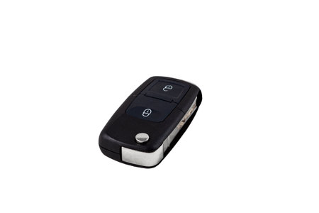 Car key with open and close buttons remote control isolated on whiteの写真素材