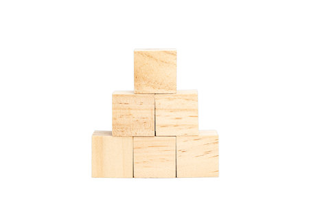 Isolated pyramid of wooden cubes on a pure white background.