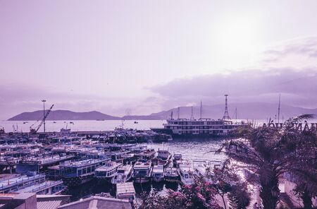 Beautiful sunset sea view in the port with a lot of boats. deal for use in the design of wallpaper or website.の写真素材