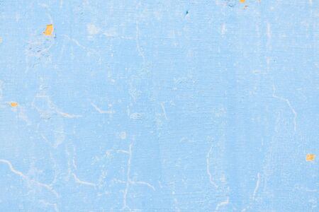 Old texture turquoise blue cracked wall, the old paint texture is chipping and cracked fall destruction.の写真素材
