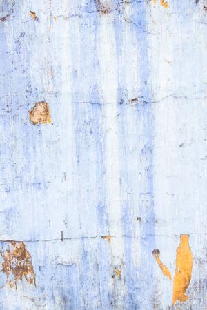 Old texture turquoise blue cracked wall, the old paint texture is chipping and cracked fall destruction.の写真素材