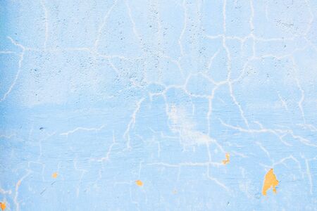 Old texture turquoise blue cracked wall, the old paint texture is chipping and cracked fall destruction.の写真素材