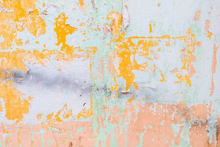 Old texture turquoise blue cracked wall, the old paint texture is chipping and cracked fall destruction.の写真素材
