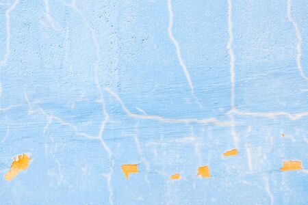Old texture turquoise blue cracked wall, the old paint texture is chipping and cracked fall destruction.の写真素材
