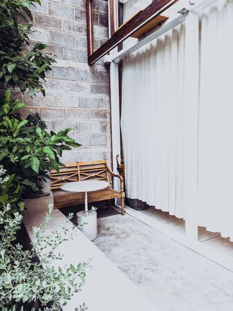 Caffe terrace in front of a modern buildingの写真素材