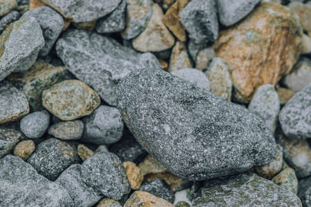 Small and big smooth round pebbles, sea dry stones, multicolour gray gravel. Abstract Composition Textured background. Ideal for web banner designの写真素材