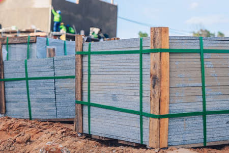 Industrial building cement pressed materials. Concrete block cement brick. Finished products on...