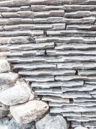 VERTICAL Decor stone brick wall texture, siding horizontal lines different sized shapes. Beautiful nature wallpaper. Romantic simple. Abstract grunge WHITE light grey shades backgroundの写真素材