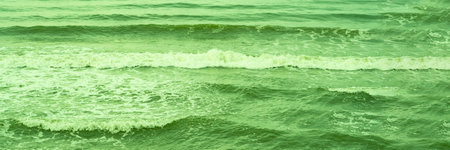 Real photo sea water waves, abstract background, nature power, bright green more tone in stockの写真素材