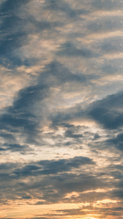 Atmosphere panorama Dramatic Sky Sunset Sunrise Dark orange rosy yellow blue pink cloud backgroundの写真素材