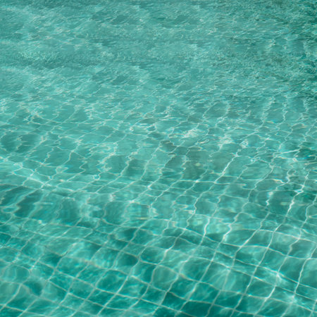 Abstract background Patterns Ripped water Surface swimming pool Light Reflection Vibrant blue greenの写真素材