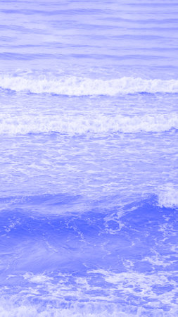 Real photo sea water waves, abstract background, nature power, pale light blue more tone in stockの写真素材