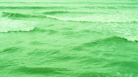 Real photo sea water waves, abstract background, nature power, bright green more tone in stockの写真素材