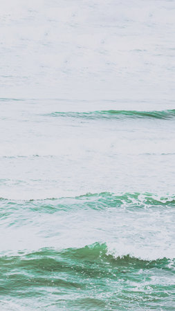 Real photo sea water waves, abstract background, nature power, pale light contrast green matte moreの写真素材