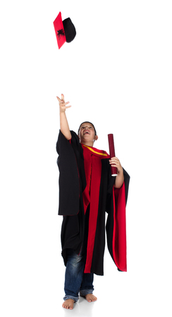 Young caucasian boy wearing graduation attire.の写真素材