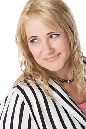Adult blonde caucasian businesswoman wearing a pink top and a striped jacket. Image is isolated on a white background.の写真素材